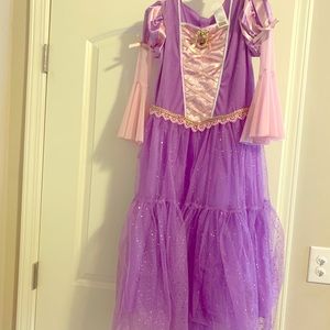 Disney Rapunzel dress-up costume with wand